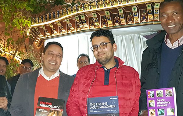 four SPANA vets with their books