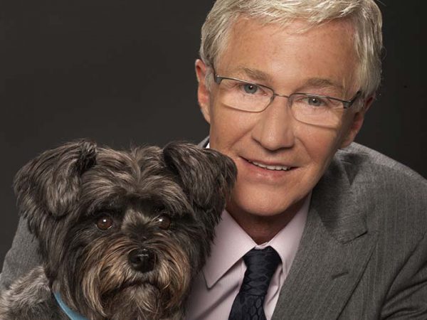 Smiling man with small dog