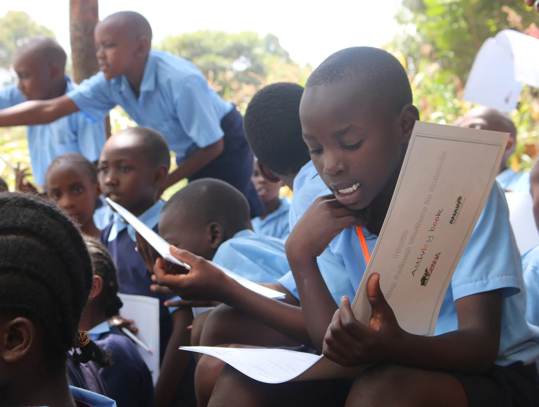 Group of children reading books