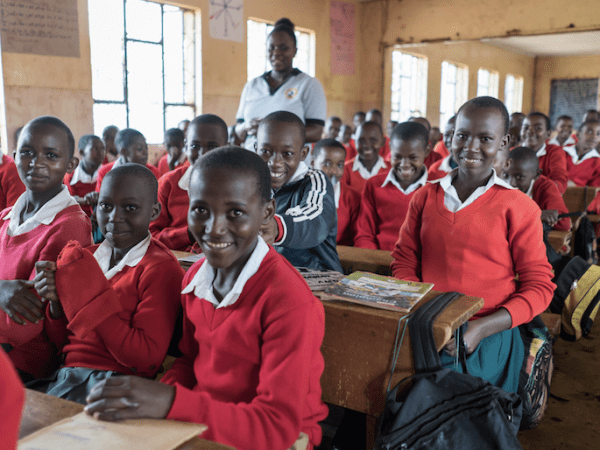 Children in red uniform in Tanzania