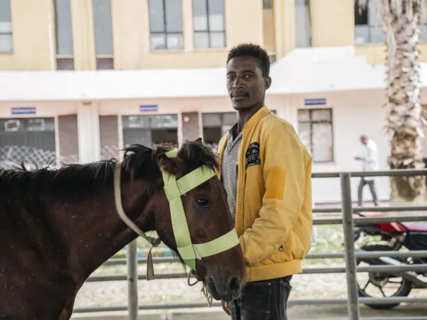 Concerned owner bringing his horse to the SPANA centre in Ethiopia